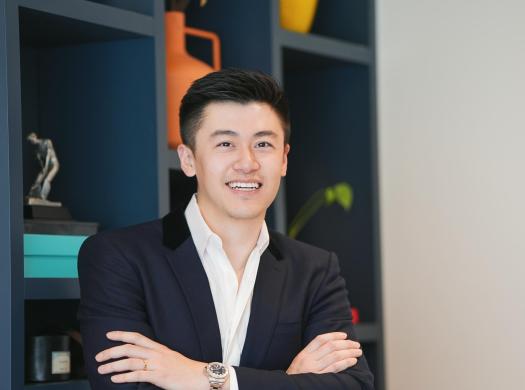 Justin Qiao real estate advisor portrait